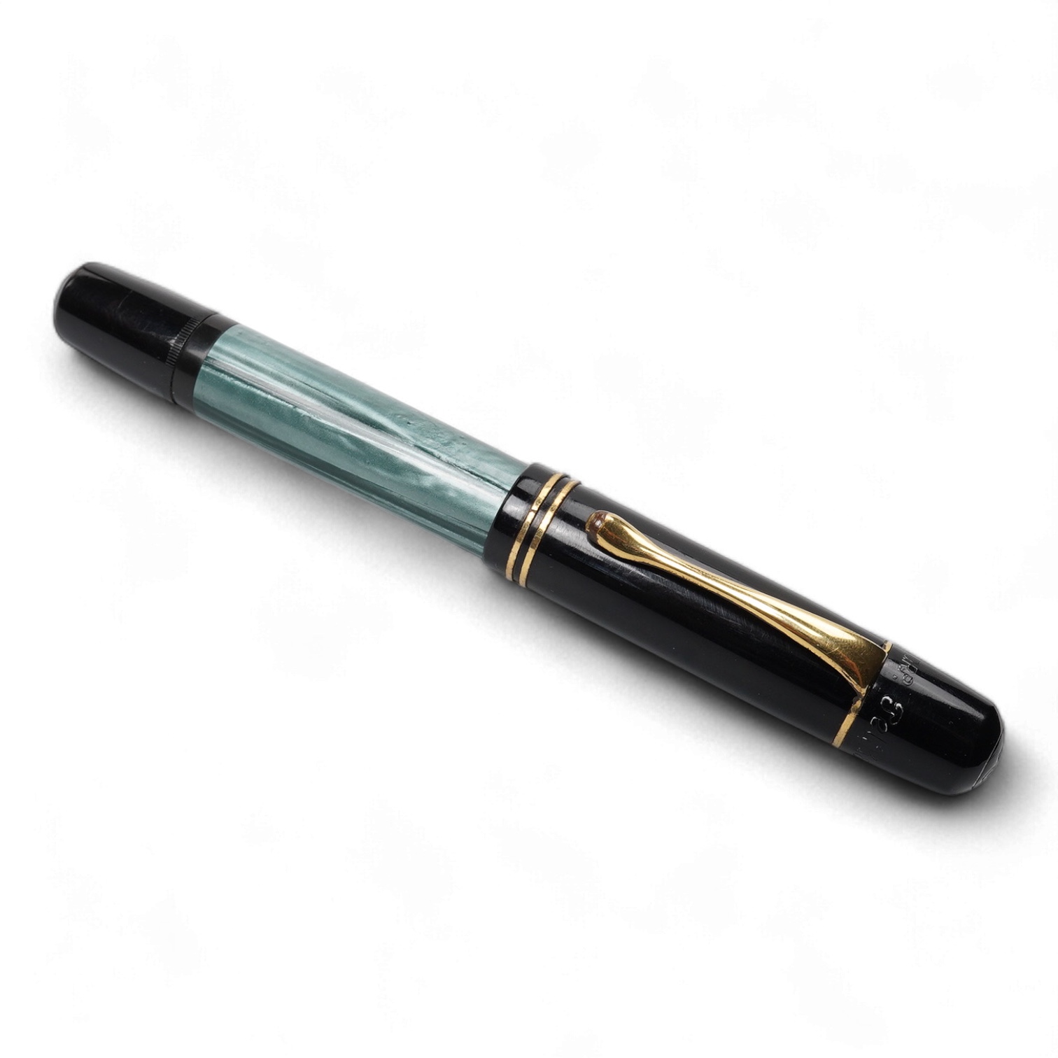 A Pelikan 100N fountain pen fitted with a 14ct. gold Pelikan nib
